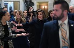 Speaker of the House Nancy Pelosi(D-Calf.) walks to the House floor to launch the proceedings that ended with the impeachment of President Donald Trump on Dec. 18, 2019. (Photo by SAUL LOEB/AFP via Getty Images)