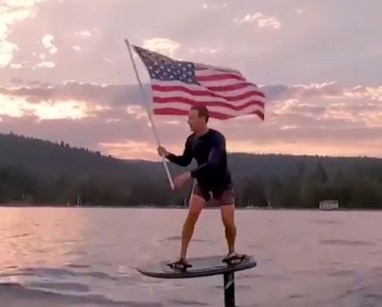  Zuck Goes Full Cringe: Anti-American Globalist Mark Zuckerberg Rides Hydrofoil Surfboard with US Flag for 4th of July