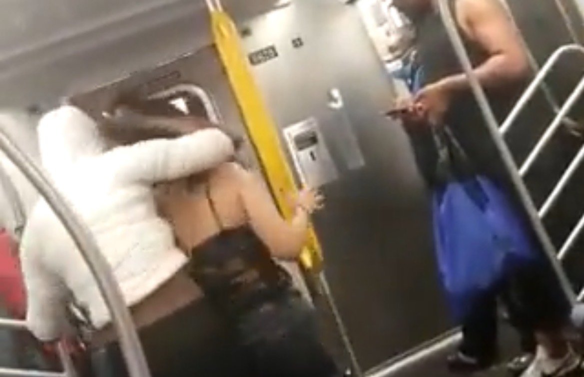  “Please Help Me” – Woman Begs For Help As Man Grabs Her Hair, Shouts Threats on New York Subway (VIDEO)