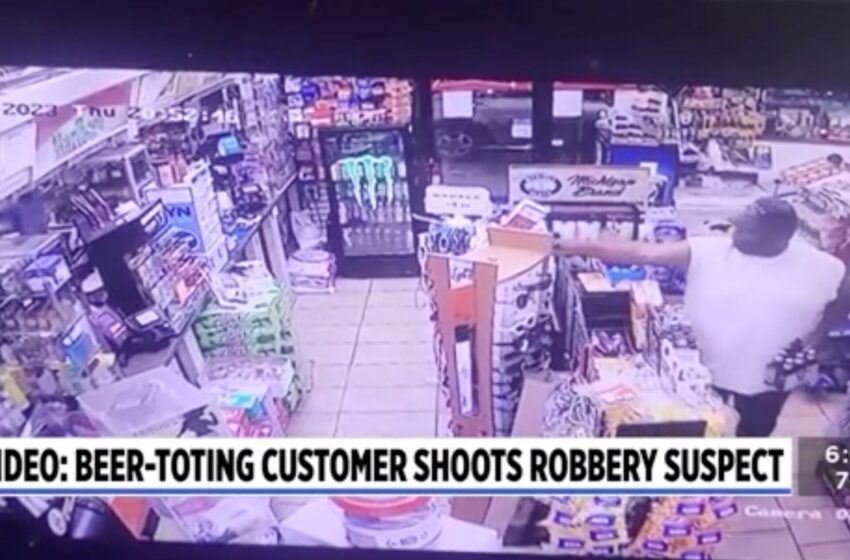  VIDEO: Michigan Man “Calmly” Guns Down Violent Armed Robber in Gas Station While Holding a Six-Pack of Beer